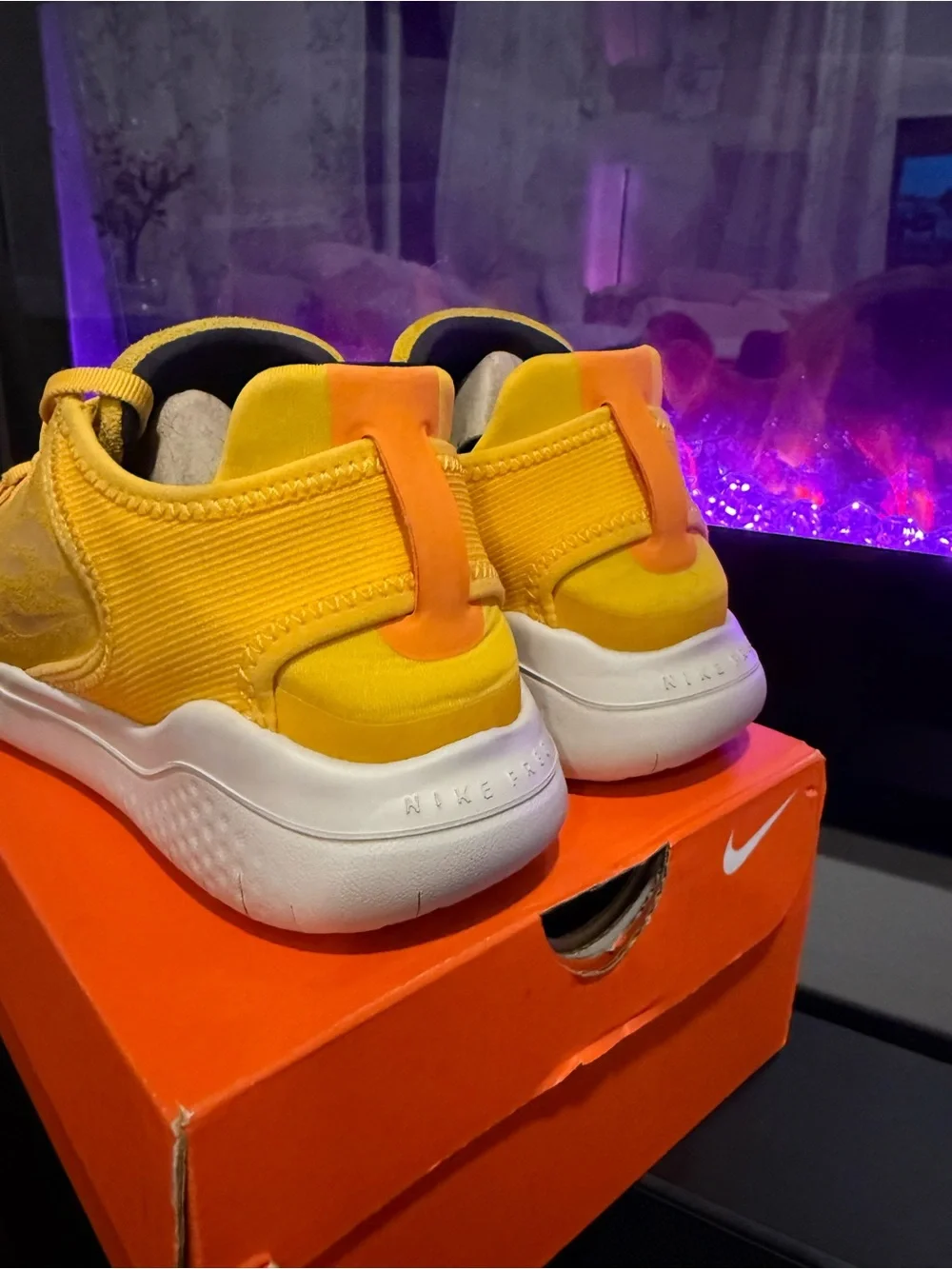 Nike Women’s Yellow Leopard-Print Free RN Sneakers